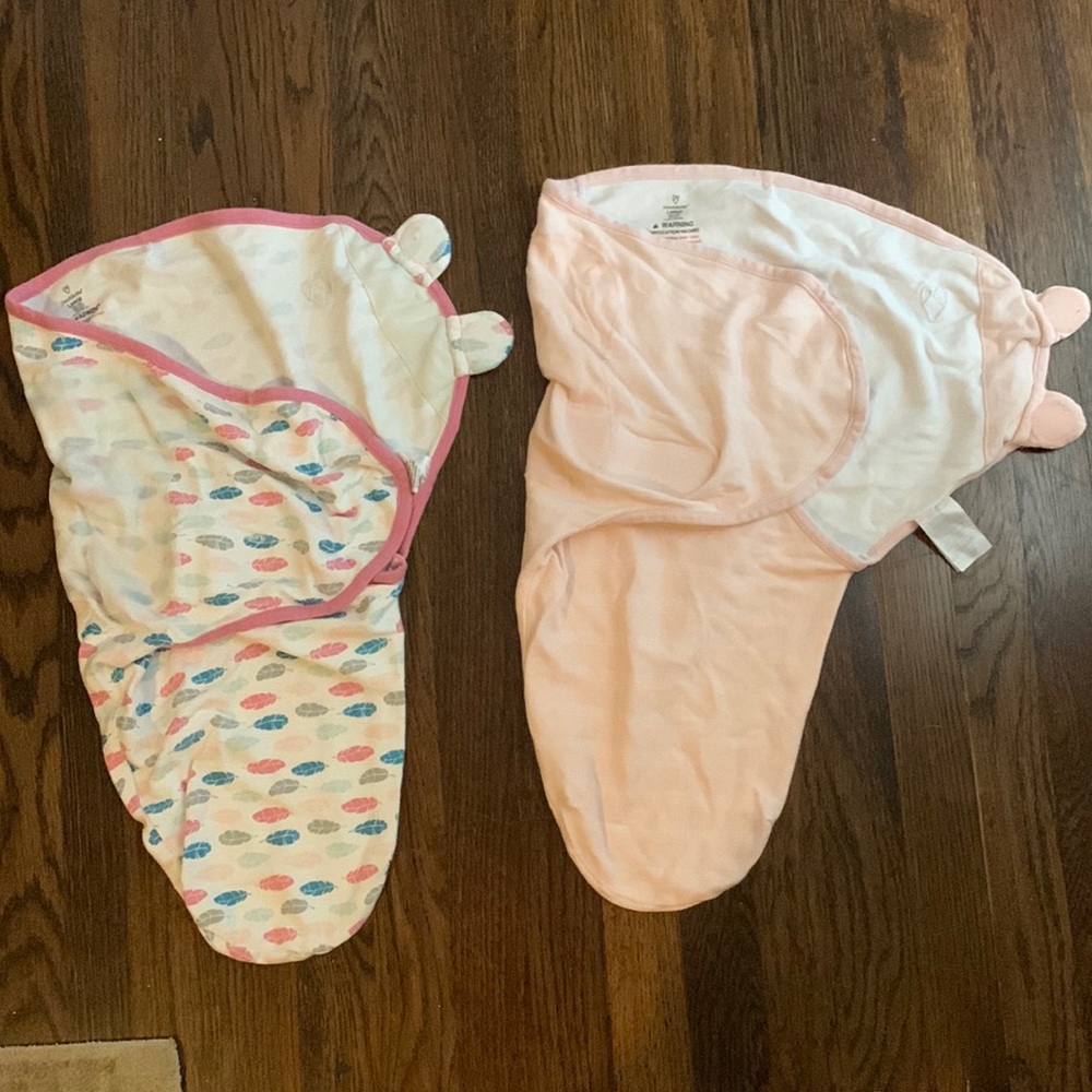 Two SwaddleMe swaddles Pink
